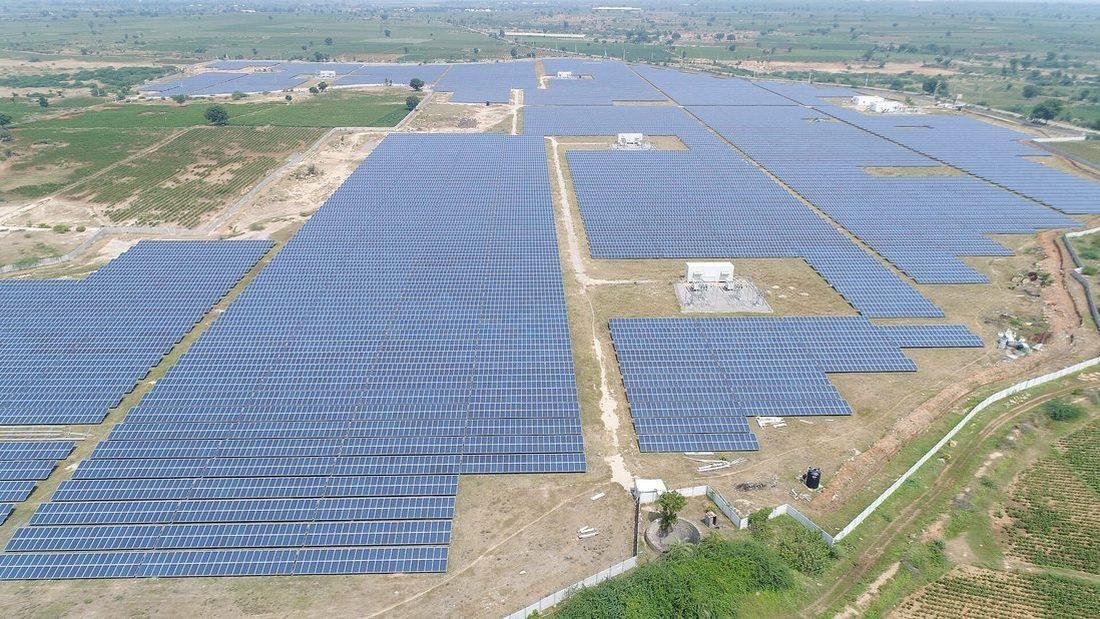 Grid-connected solar power plant in India exporting electricity to the distribution network