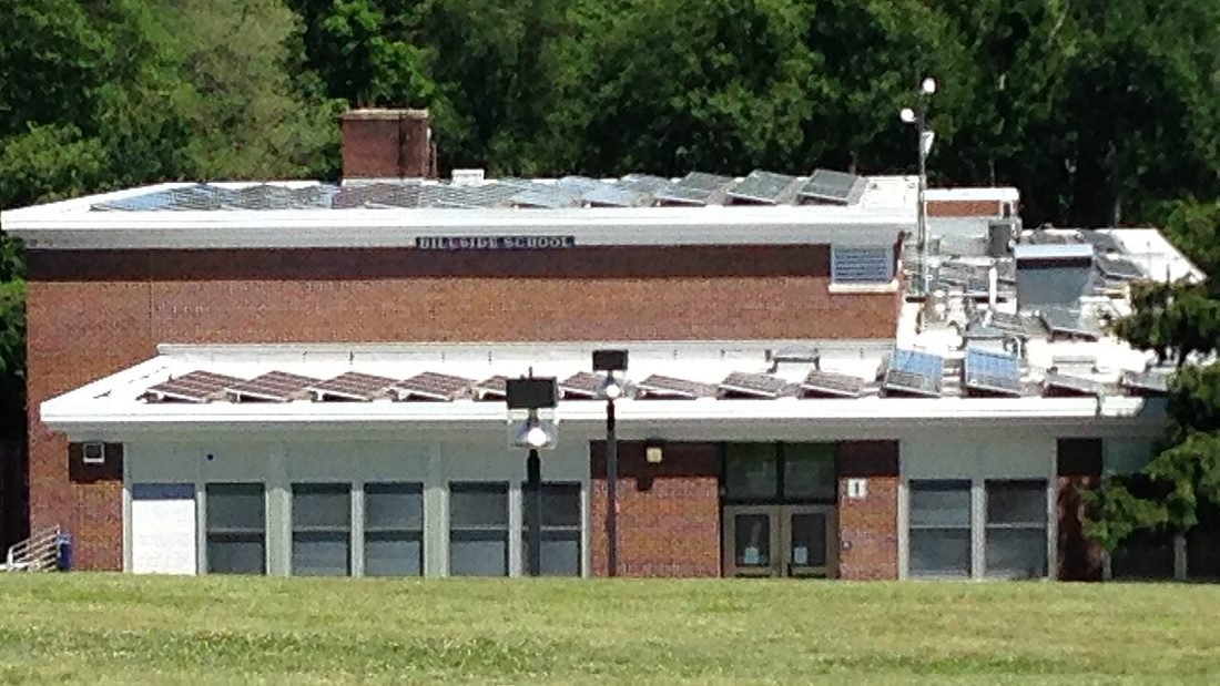 Solar panels on the roof of a school building, an example of solar for schools and colleges