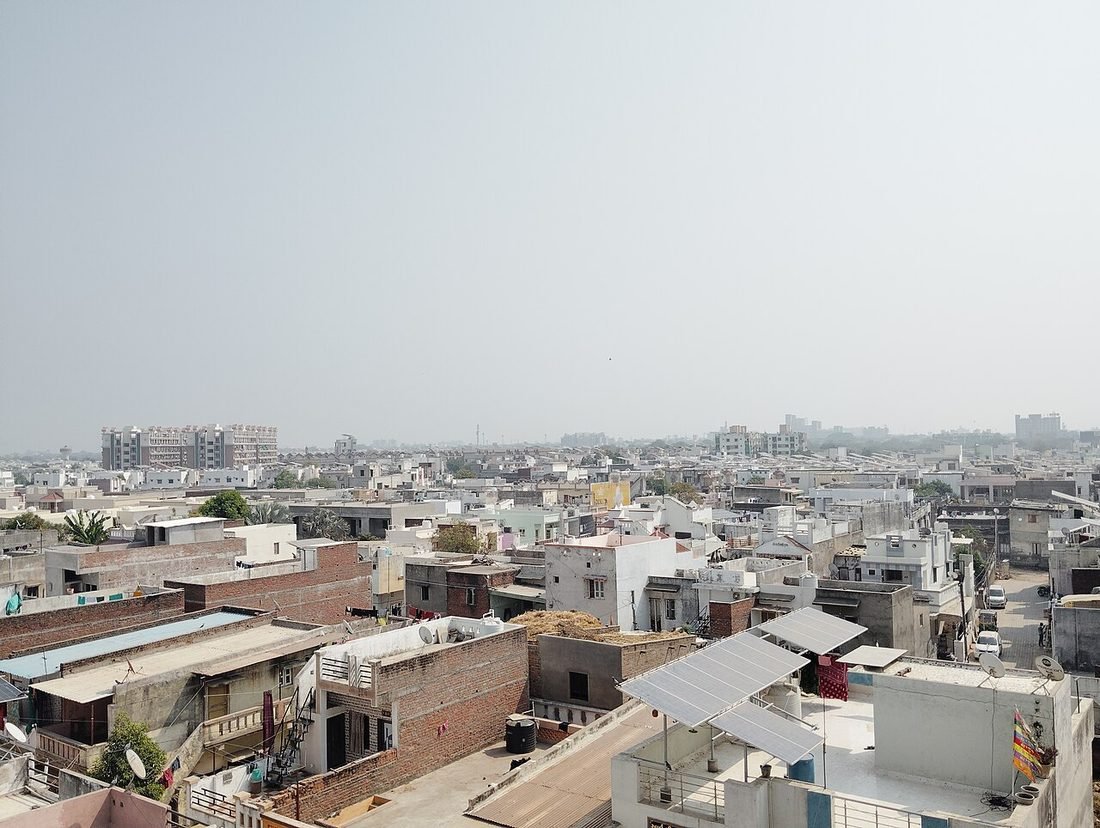 Rooftop solar panels installed on Indian homes showing completed installation work