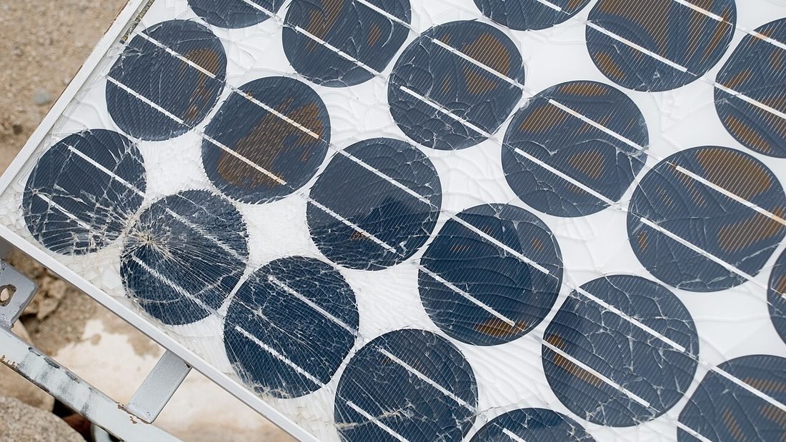 Damaged solar panel with cracked cells, used to illustrate common solar myths and what really happens to panels