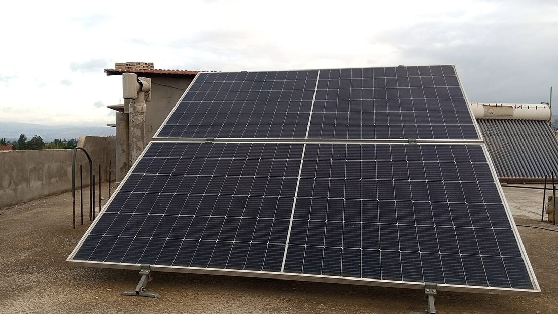 Four rooftop solar panels on a house roof, a solar-ready roof of the kind planned in a new house